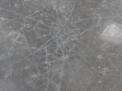 Small cracks in the ice. First ice. Slippery Stock Photos