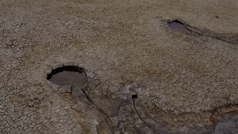 Small craters in the mud Stock Footage 123164738