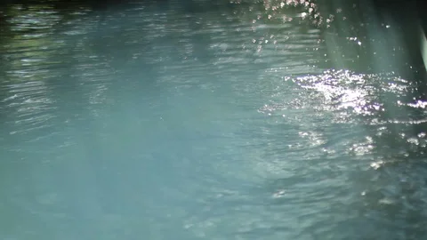 A small creek  with filter on front making lens flares Stock Footage 86769766