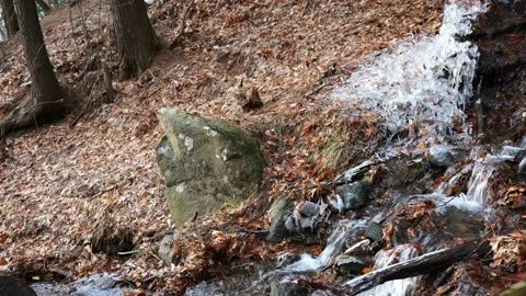 Small creek with waterfall on rocks 10 Stock Footage 224178456