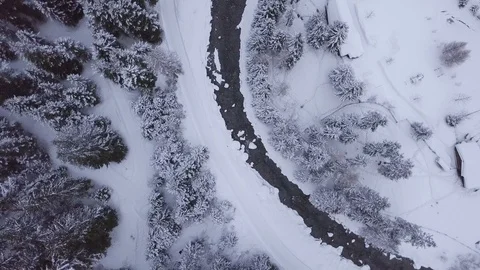 Small Creek In Winter Snowy Forest Aerial Stock Footage 104115943