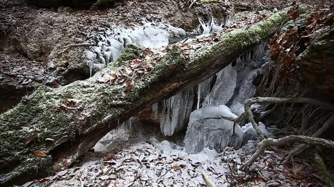 Small creek winter waterfall Stock Footage 99445014