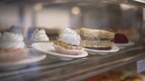 Small Creme Cake in Shopping Window Stock Footage 151797049