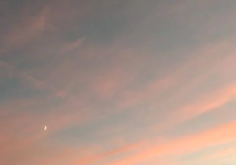 Small Crescent Moon at Dusk Stock Photos