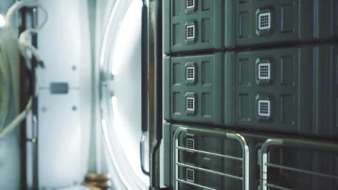 Small crew storage. Organized clutter in confined astronaut living space Stock Footage 333555291