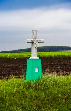 Small cross by the road Stock Photos