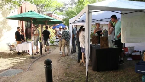 Small crowd at cannabis fair Stock Footage 154561907