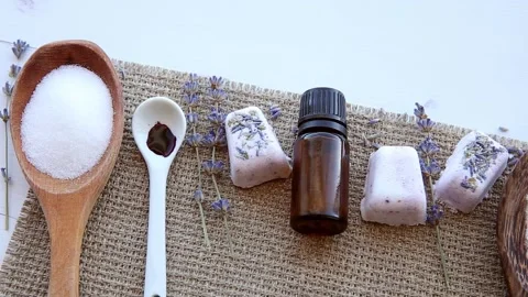 Small cube shape bathroom bath fizzies on wood tray. Stock Footage 148857059