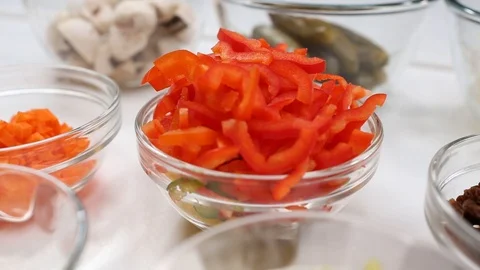 Small cubes of fresh red pepper slider beauty shot Stock Footage 110812906