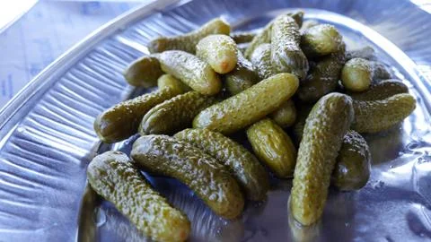Small cucumbers on the plate Stock-Fotos