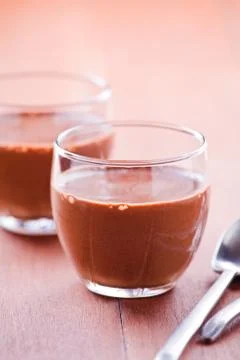Small cups of chocolate mousse Stock Photos