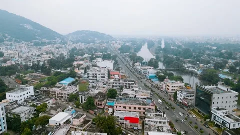 Small dam over Krishna river tributary canal in Vijayawada city, India. Stock Footage 280732748