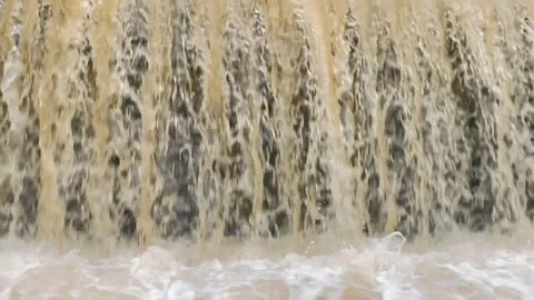Small Dam Waterfall Flowing with Strong Water Current Video stock 328684183