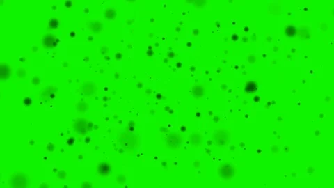 Small dark particles falling and flying on the green screen background Stock Footage 101210092
