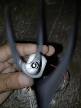 A small DC motor connected to a battery Foto stock