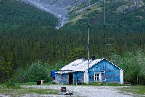 Small decayed house the mountains Stock Photos