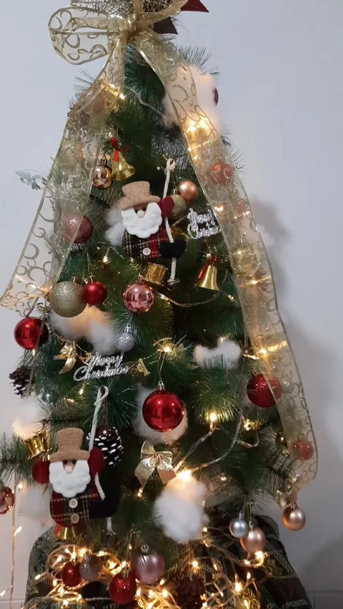 Small Decorated Christmas Tree with Warm Lights Stock Footage 331419317