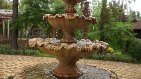 Small decorative fountain in the fall Stock Footage 125333608