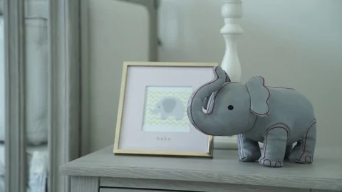 Small decorative toy elephant on the dressing table Stock Footage 76693535