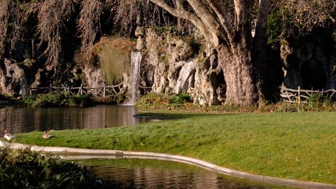 A small decorative waterfall in the Park or in the garden. Landscape design. Stock Footage 123162998