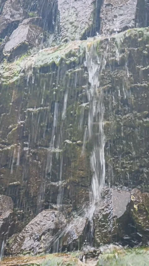 Small decorative waterfall stones vertical video Stock Footage 336534342