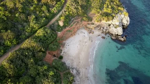 Small deserted beach at sunset in Alghero Sardinia Stock Footage 138891058