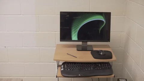 Small Desk Computer Ribbons Wallpaper Slow Push In Stock Footage 87850549