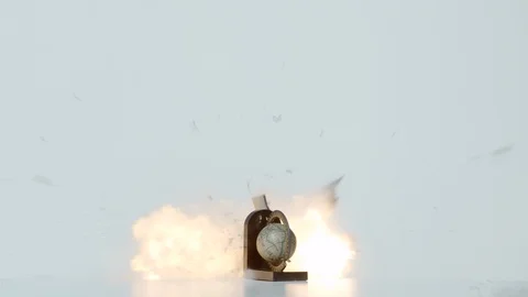 Small desk globe exploding, Ultra Slow Motion Video stock 86696699