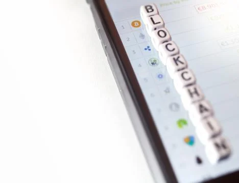 Small dices on phone screen Stock Photos