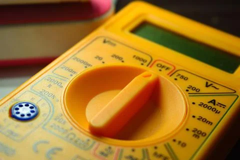 A small digital micrometer. A multimeter is an electronic measuring instrument Stock Photos
