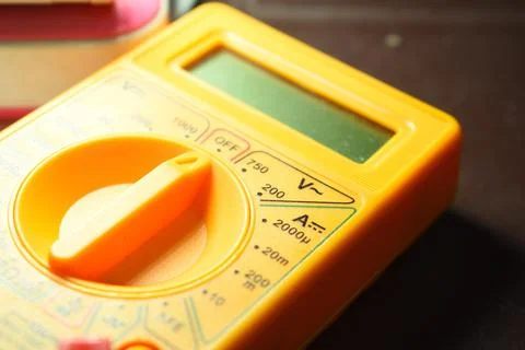 A small digital micrometer. A multimeter is an electronic measuring instrument Stock Photos