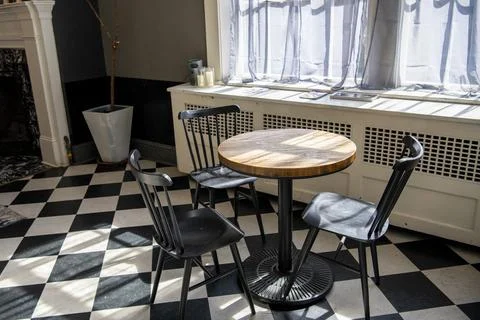 Small Dining Table in Boutique Hotel or Vacation Rental Stock Photos