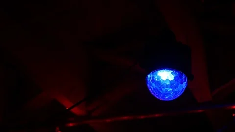 Small Disco ball on the ceiling of night club Stock Footage 83962326