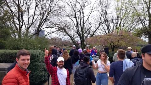 Small diverse crowd boogie with DJ outside entrance to Philly Art Museum Vídeo Stock 296032884