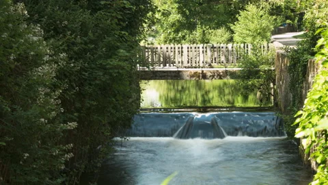 A small diversion of the river Timelapse, under a bridge, Limoge, France Video stock 159292920