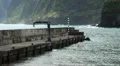 Small dock at Madeira's rocky mountain coastline HD Footage
