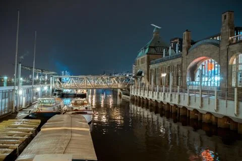 A small dock at night with colored lights in Hamburg Stock Photos