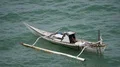 Small domestic traditional indonesia boats anchored on sea near coast 4k or 4k+ Resolution