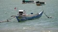 Small domestic traditional indonesia boats anchored on sea near coast 4k or 4k+ Resolution