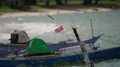 Small domestic traditional indonesia boats anchored on sea near coast 4k or 4k+ Resolution