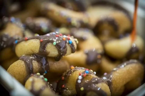 Small donuts in a box Stock Photos