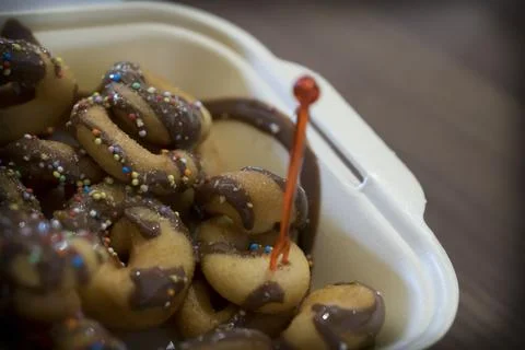 Small donuts in a box Stock Photos