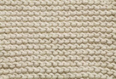 Small dots worked with knitting needles Stock Photos