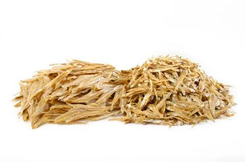 Small dried fish on white background Stock Photos