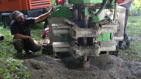 Small drilling rig   drilling water well for the country house. Stockbeeldmateriaal 219260265