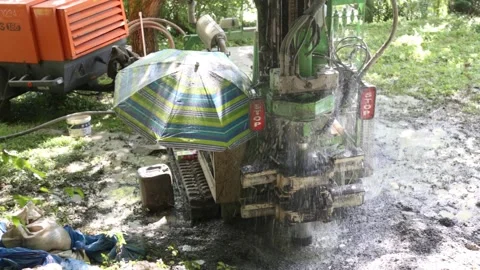 Small drilling rig   drilling water well for the country house. Stockbeeldmateriaal 219260621