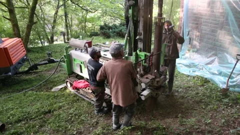 Small drilling rig   drilling water well for the country house. 库存影片 219260686