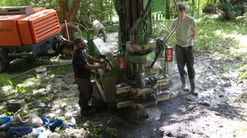 Small drilling rig   drilling water well for the country house. Stockbeeldmateriaal 219260723