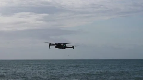 Small drone flies over a beach. Stock Footage 255116275