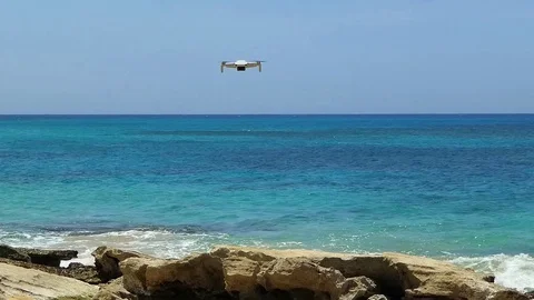 Small Drone Flying in The Shore Stock Footage 130154416